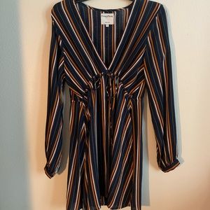 Long sleeved dress with pull string for neck line